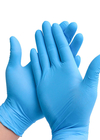Saupoudrez l'élastique bleu jetable libre de catégorie comestible de gants de nitriles