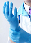 Saupoudrez l'élastique bleu jetable libre de catégorie comestible de gants de nitriles